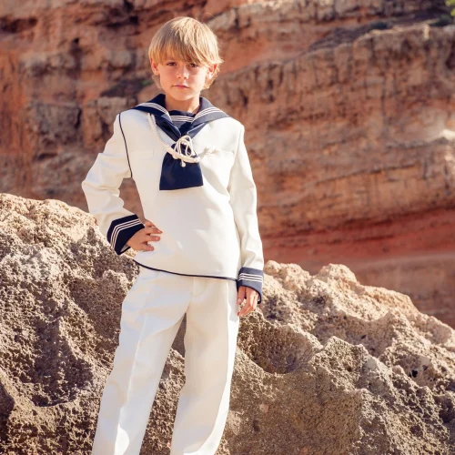 kid-in-marine-outfit-standing-on-rocky-cliff-2025-01-06-18-10-26-utc.webp